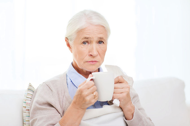 Image of aptient drinking a cup of tea